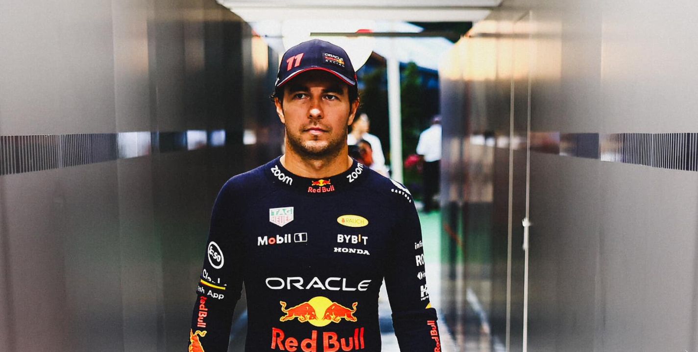 SINGAPORE, SINGAPORE - SEPTEMBER 17: Sergio Perez of Mexico and Oracle Red Bull Racing walks in the garage prior to the F1 Grand Prix of Singapore at Marina Bay Street Circuit on September 17, 2023 in Singapore, Singapore. (Photo by Mark Thompson/Getty Images) // Getty Images / Red Bull Content Pool // SI202309170197 // Usage for editorial use only //
